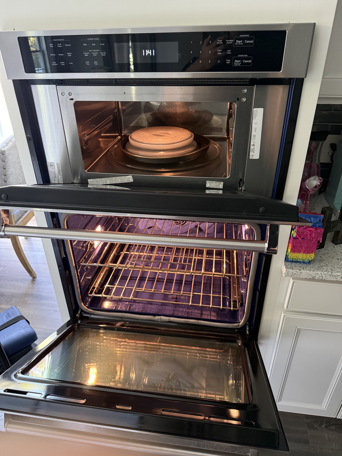 Combination unit with the oven open